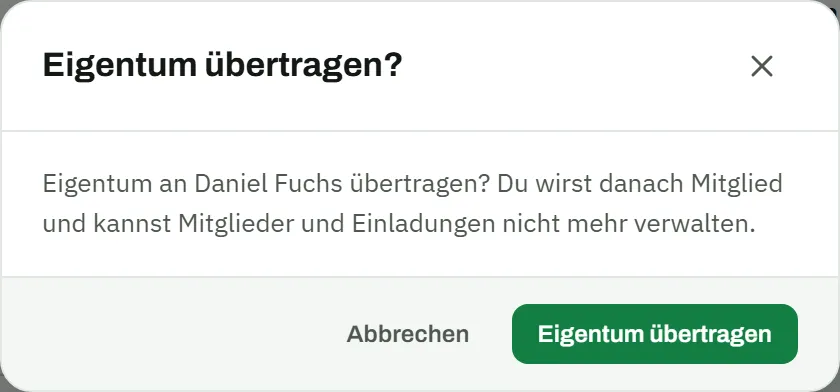 Dialog „Eigentum übertragen?" mit dem Text „Eigentum an Daniel Fuchs übertragen? Du wirst danach Mitglied und kannst Mitglieder und Einladungen nicht mehr verwalten." und den Buttons Abbrechen und Eigentum übertragen
